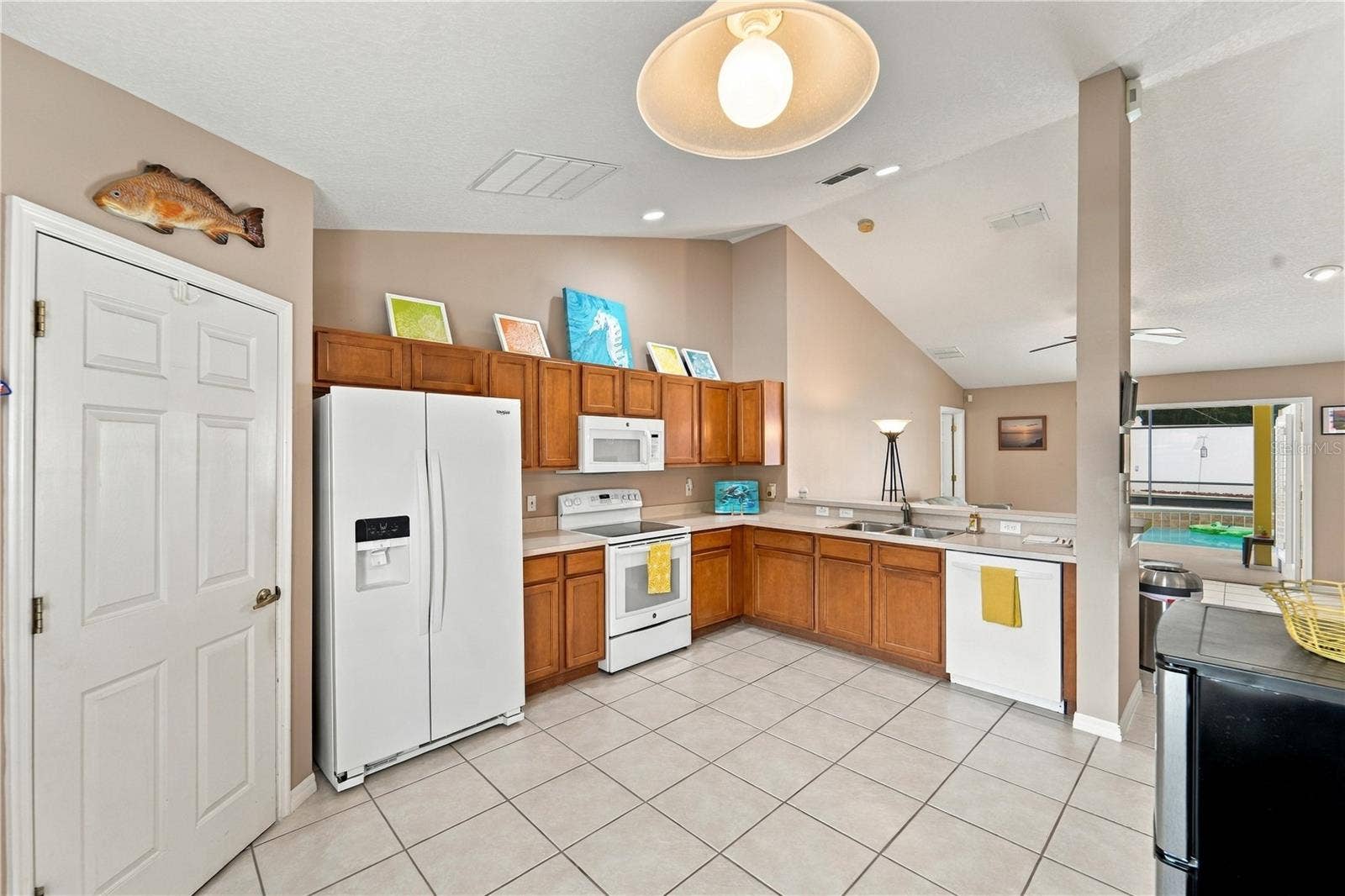 1420 BENT OAKS BOULEVARD, Deland, FL 32724 Kitchen looking towards family room and pool