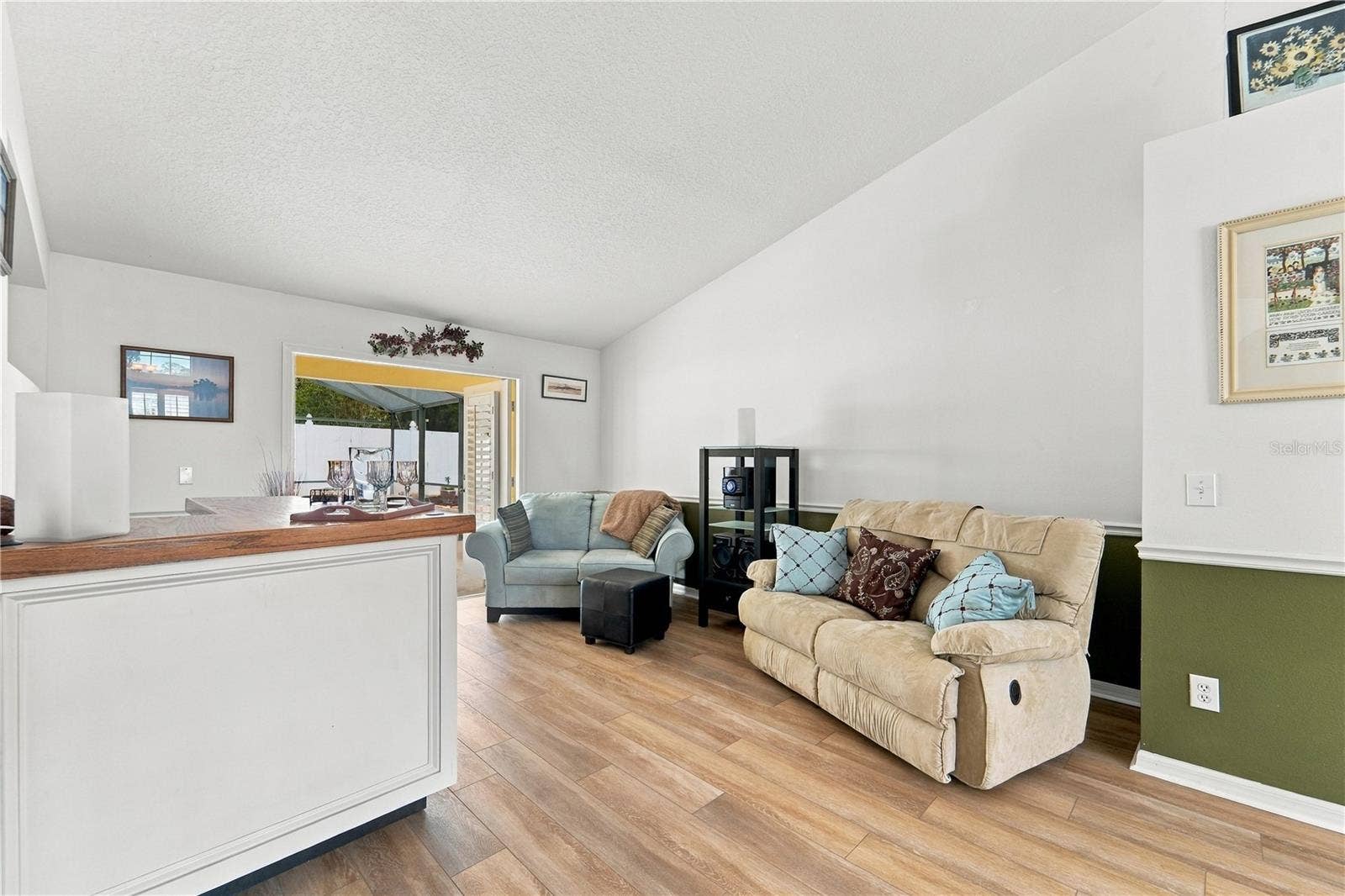 1420 BENT OAKS BOULEVARD, Deland, FL 32724 View from dining room to living room.