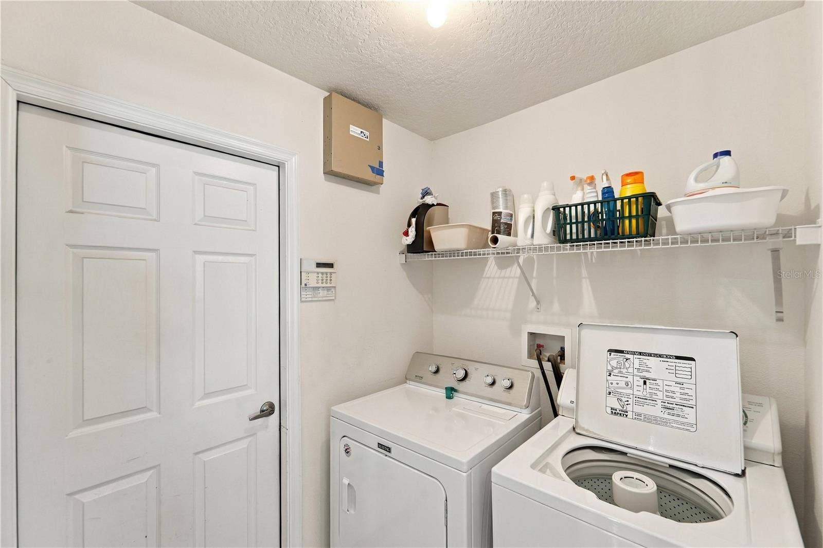 1420 BENT OAKS BOULEVARD, Deland, FL 32724 Separate laundry room accessed from kitchen.