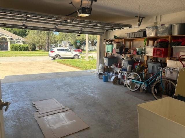 1420 BENT OAKS BOULEVARD, Deland, FL 32724 2-car garage with built in shelving and wash tub.