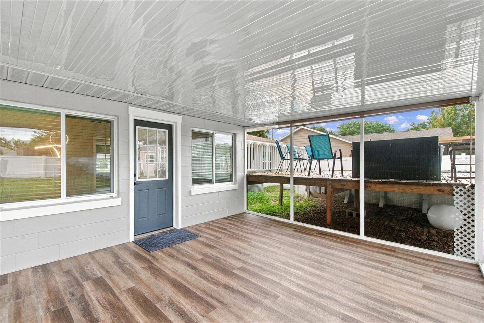 930 DORA AVENUE, Tavares, FL 32778 Back Screened, Covered Porch
