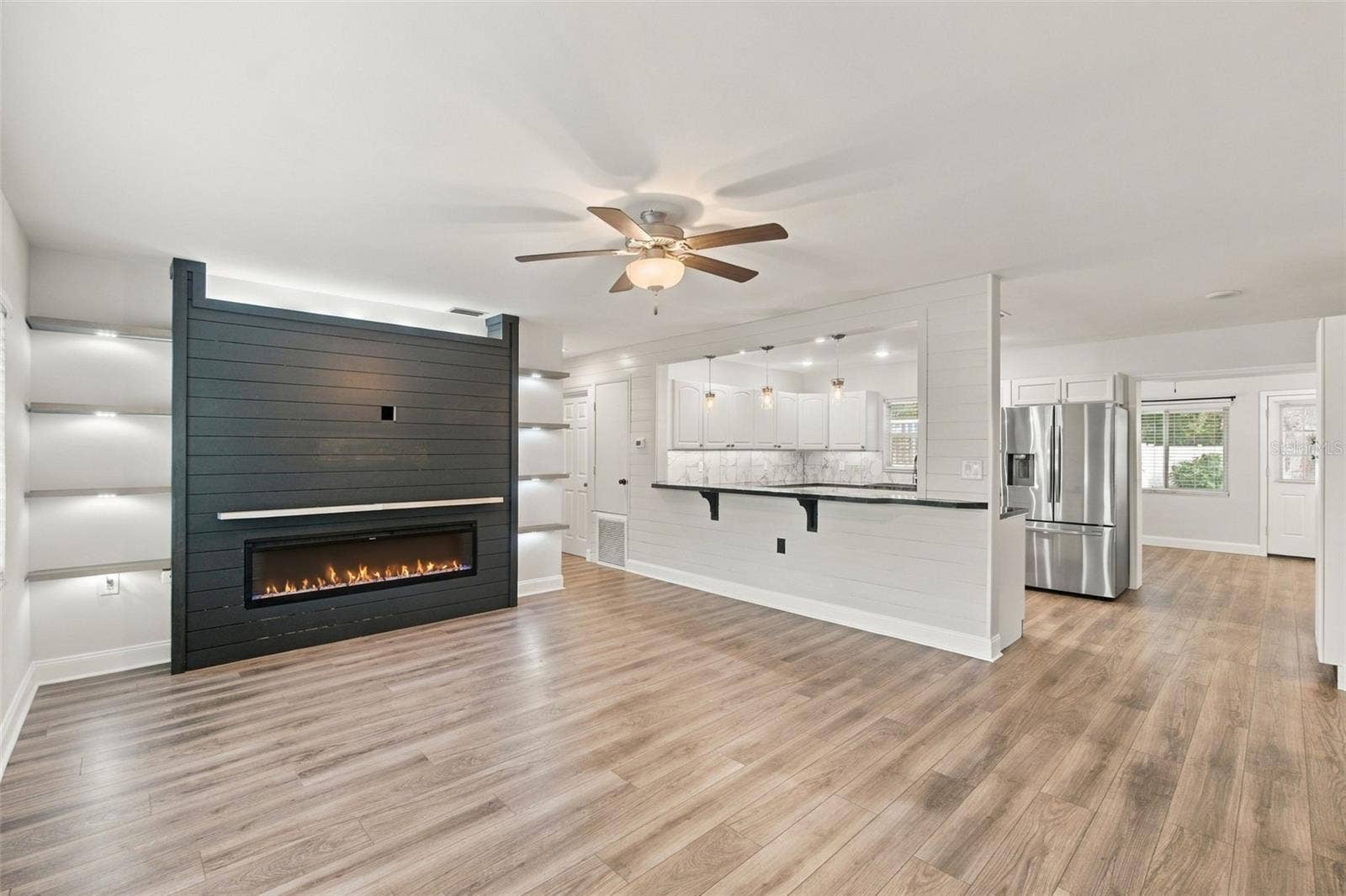 930 DORA AVENUE, Tavares, FL 32778 Living Room/Kitchen