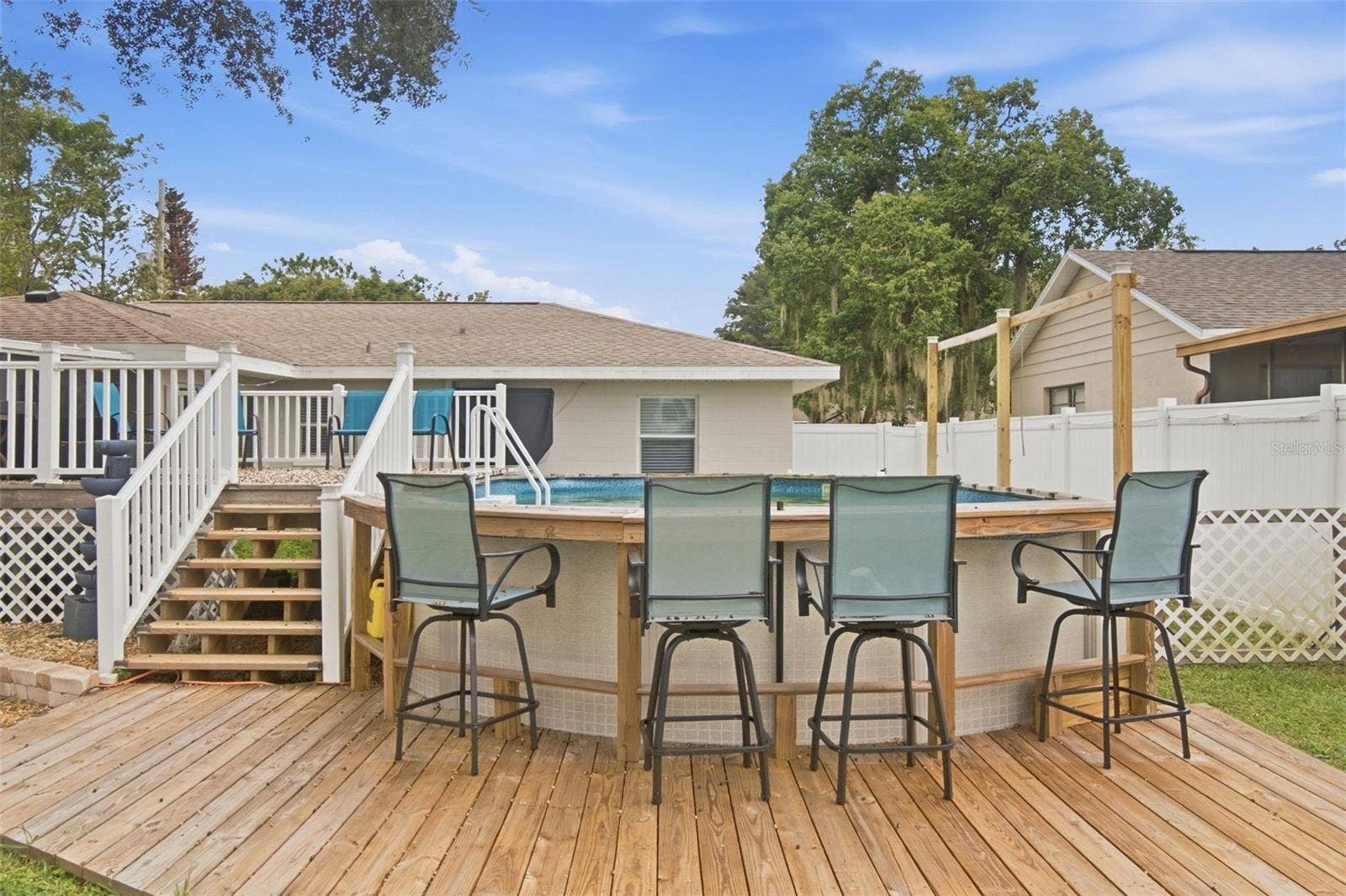 930 DORA AVENUE, Tavares, FL 32778 Above Ground Pool & Bar Deck