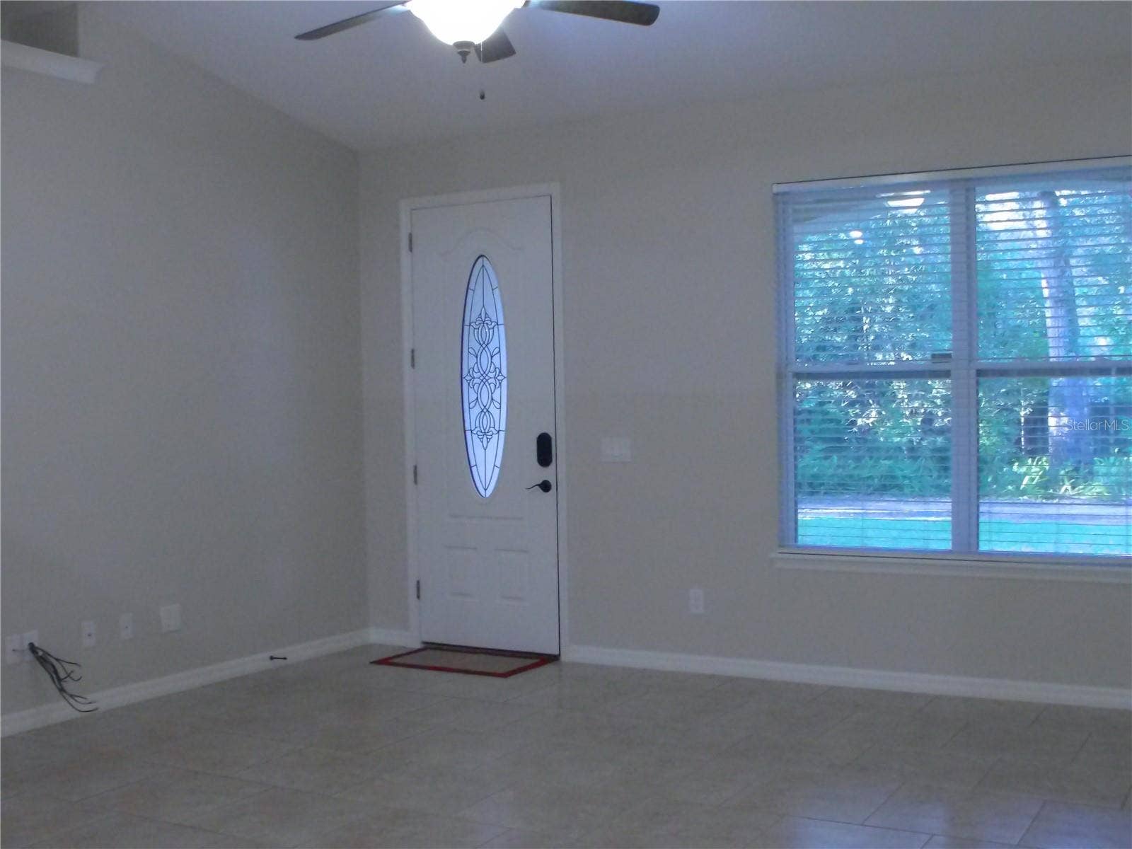 740 RUBY AVENUE, Deland, FL 32724 living room with cathedral ceilings