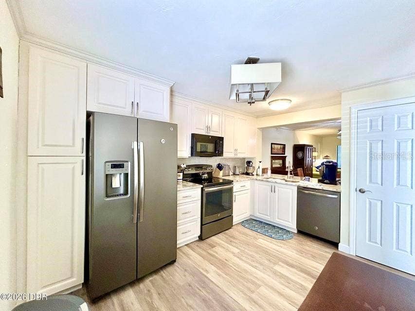 1 TOMOKA OAKS BOULEVARD, #119, Ormond Beach, FL 32174