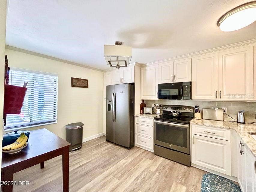 1 TOMOKA OAKS BOULEVARD, #119, Ormond Beach, FL 32174