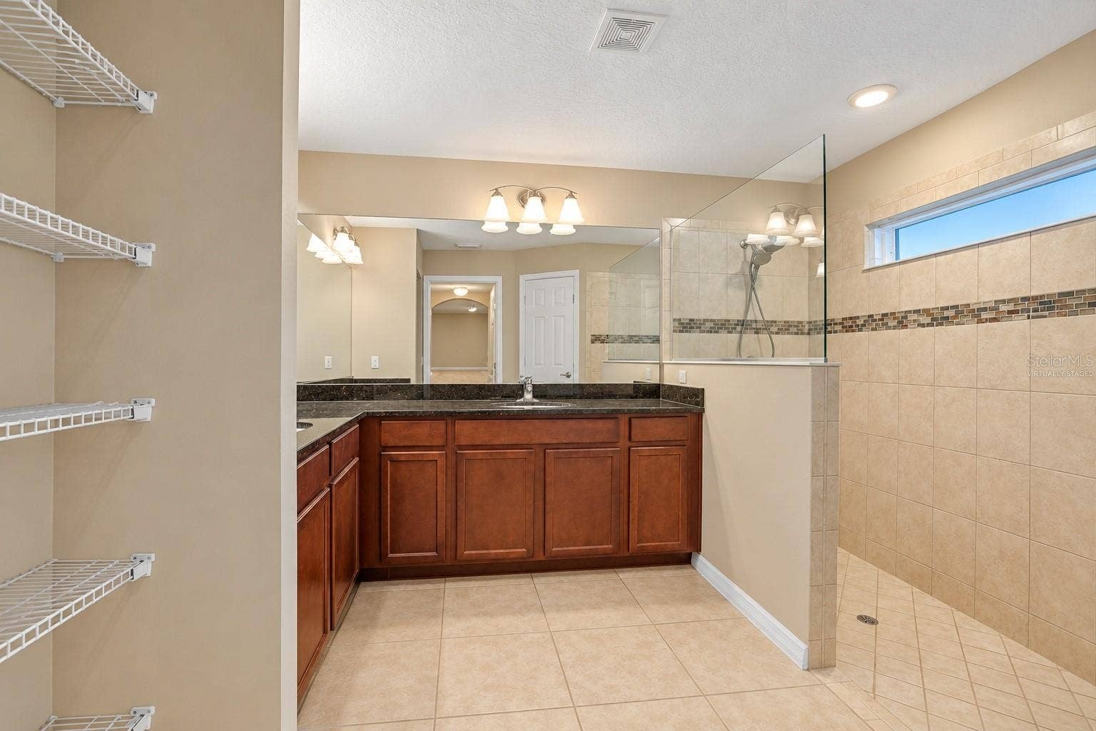 42 BECKNER LANE, Palm Coast, FL 32137 MASTER BATH- VIRTUALLY STAGED