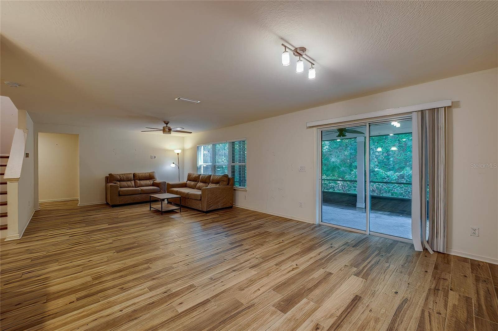 421 CHAMPION RIDGE DRIVE, Daytona Beach, FL 32124 Great room with patio access