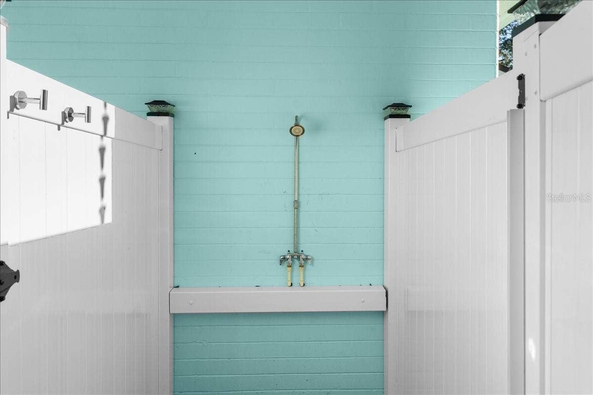 1146 RIVERSIDE DRIVE, Daytona Beach, FL 32117 Outdoor shower after a beach day