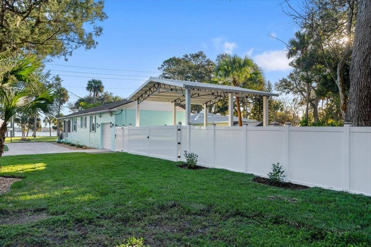 1146 RIVERSIDE DRIVE, Daytona Beach, FL 32117 Extra lot area in rear with covered RV/Boat parking