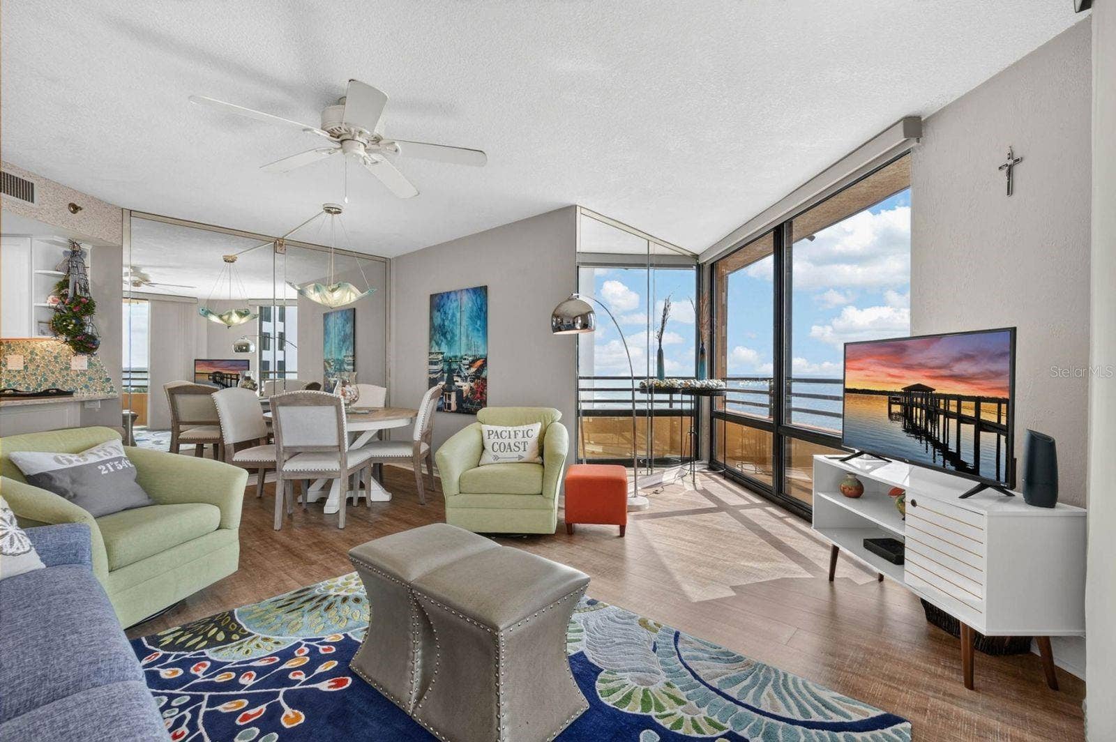 3023 S ATLANTIC AVENUE, #1106, Daytona Beach Shores, FL 32118 Living room facing dining room and ocean view