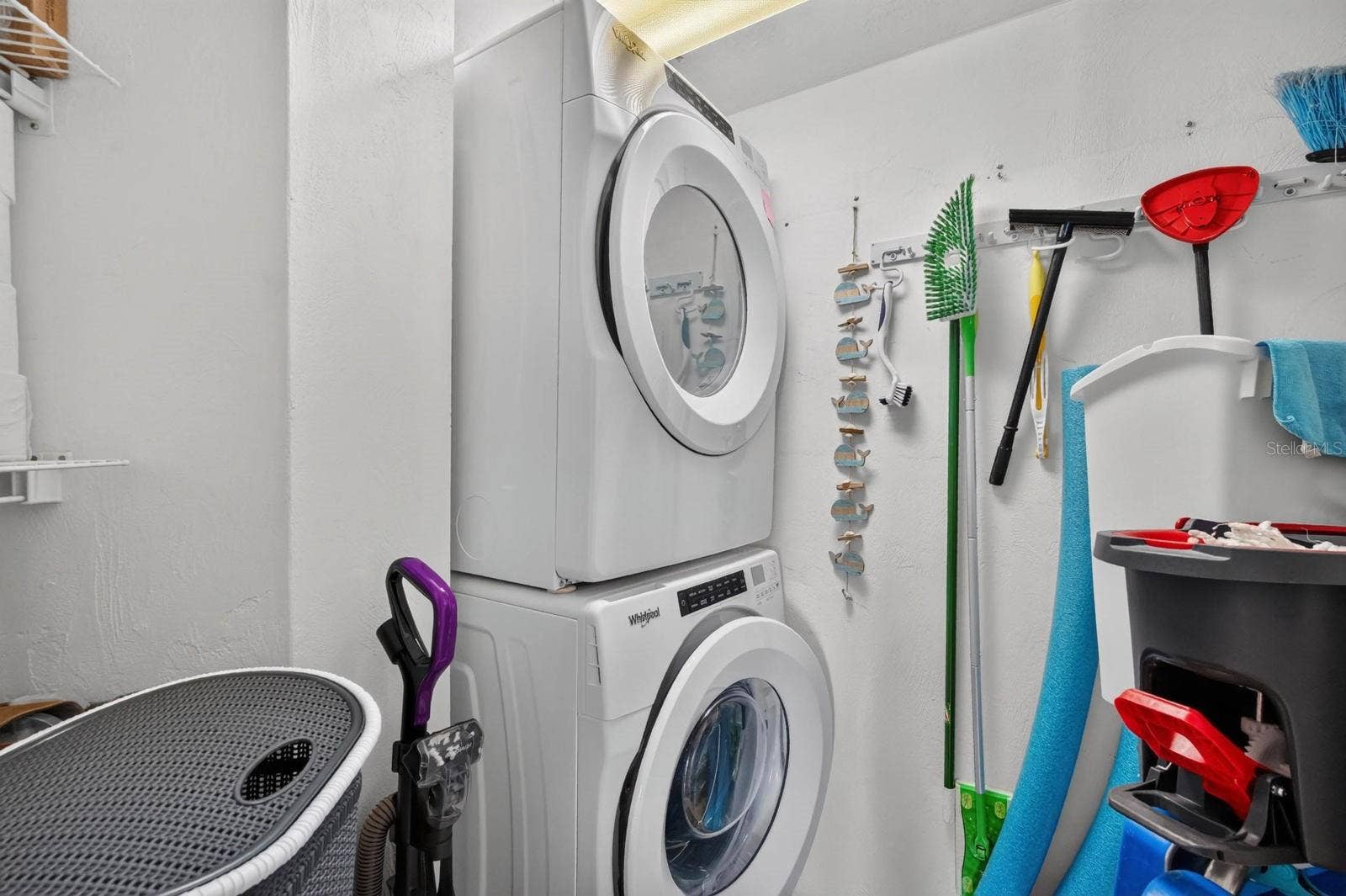 3023 S ATLANTIC AVENUE, #1106, Daytona Beach Shores, FL 32118 In Unit Laundry stacked washer and dryer