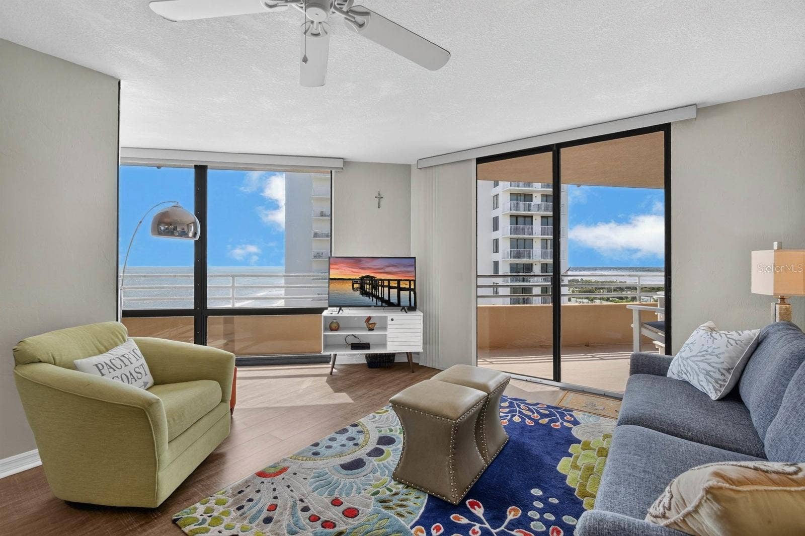 3023 S ATLANTIC AVENUE, #1106, Daytona Beach Shores, FL 32118 Living room facing left Ocean and Right Halifax river