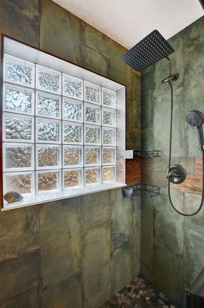 1580 DELAND AVENUE, Orange City, FL 32763 Secondary Bathroom Shower with New Tile & Stone work