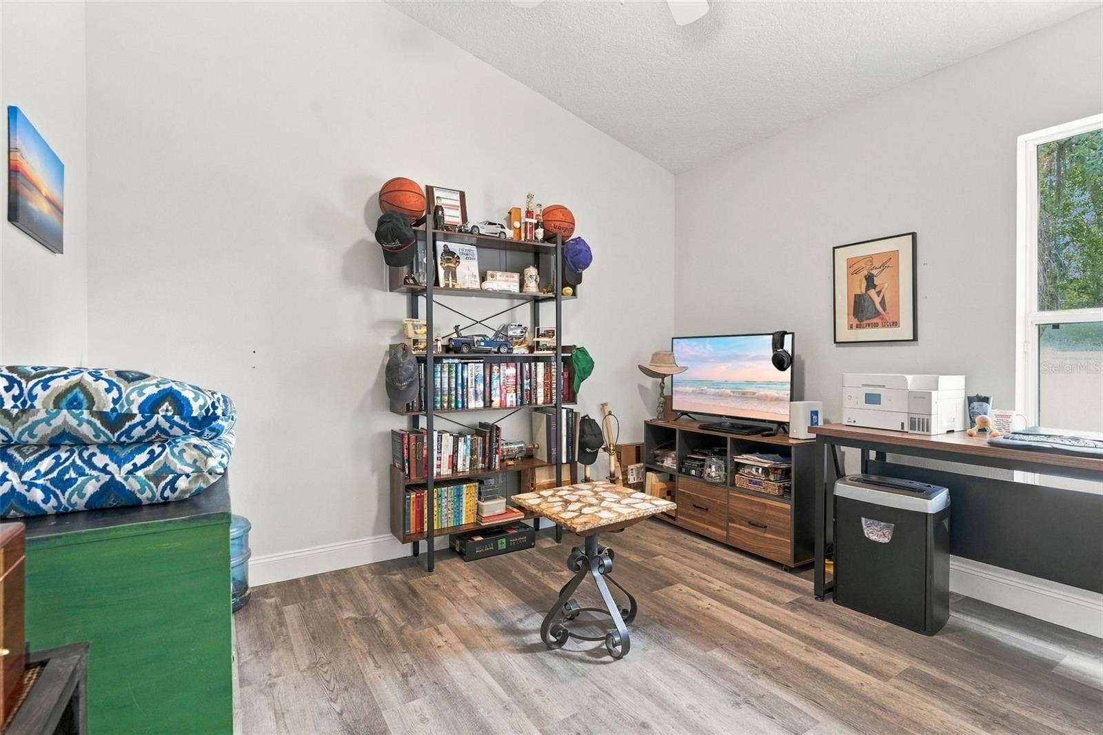 This front bedroom is currently being utilized as an office space.