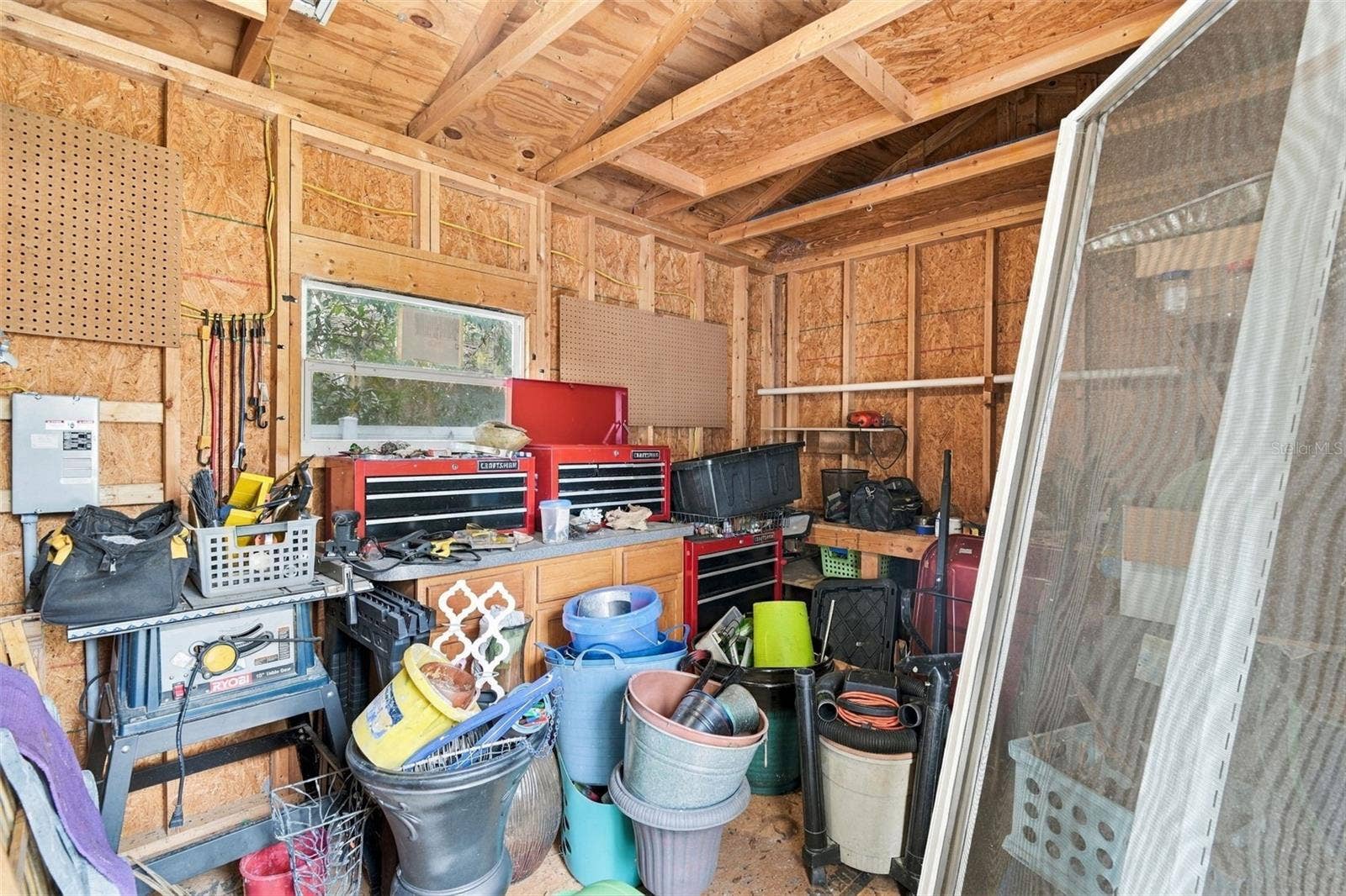 Interior of large shed/workshop with electric.