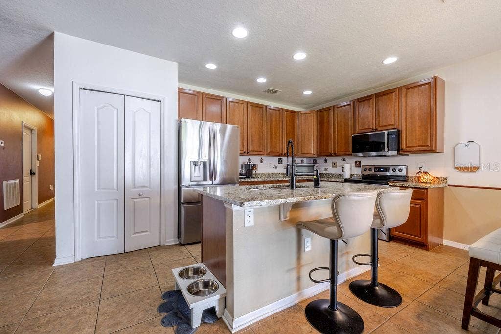 252 SHERRI LEE LANE, Deland, FL 32720 Kitchen breakfast bar and pantry