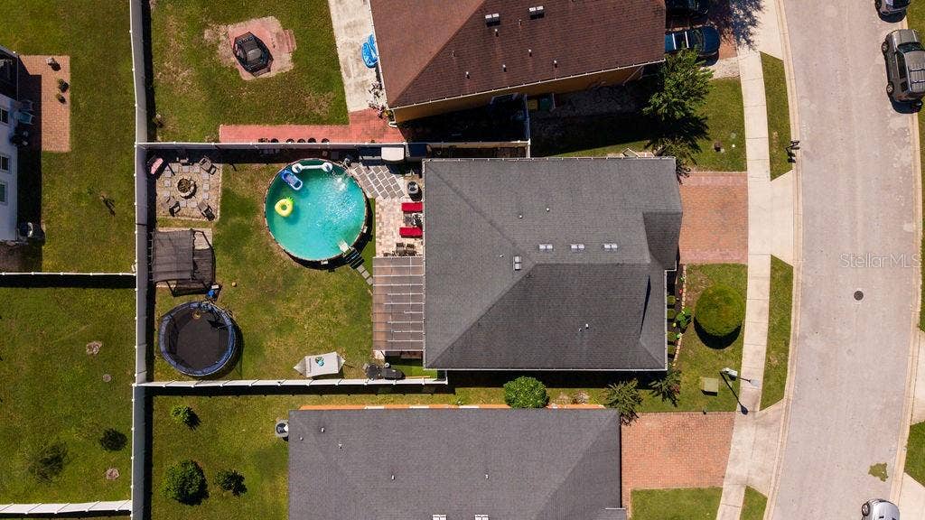 252 SHERRI LEE LANE, Deland, FL 32720 Aerial view of home with above ground pool.