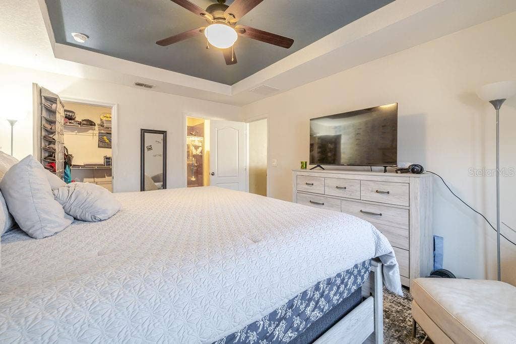 252 SHERRI LEE LANE, Deland, FL 32720 Primary bedroom with walk-in closet and ensuite bathroom