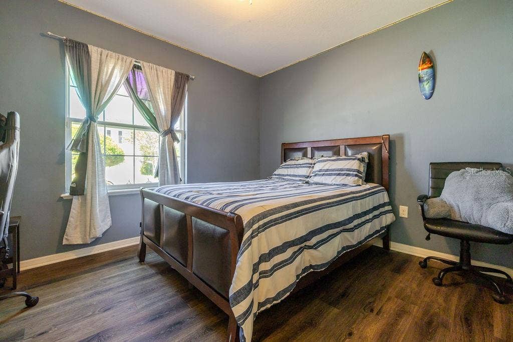 252 SHERRI LEE LANE, Deland, FL 32720 Bedroom 1 with vinyl plank floors