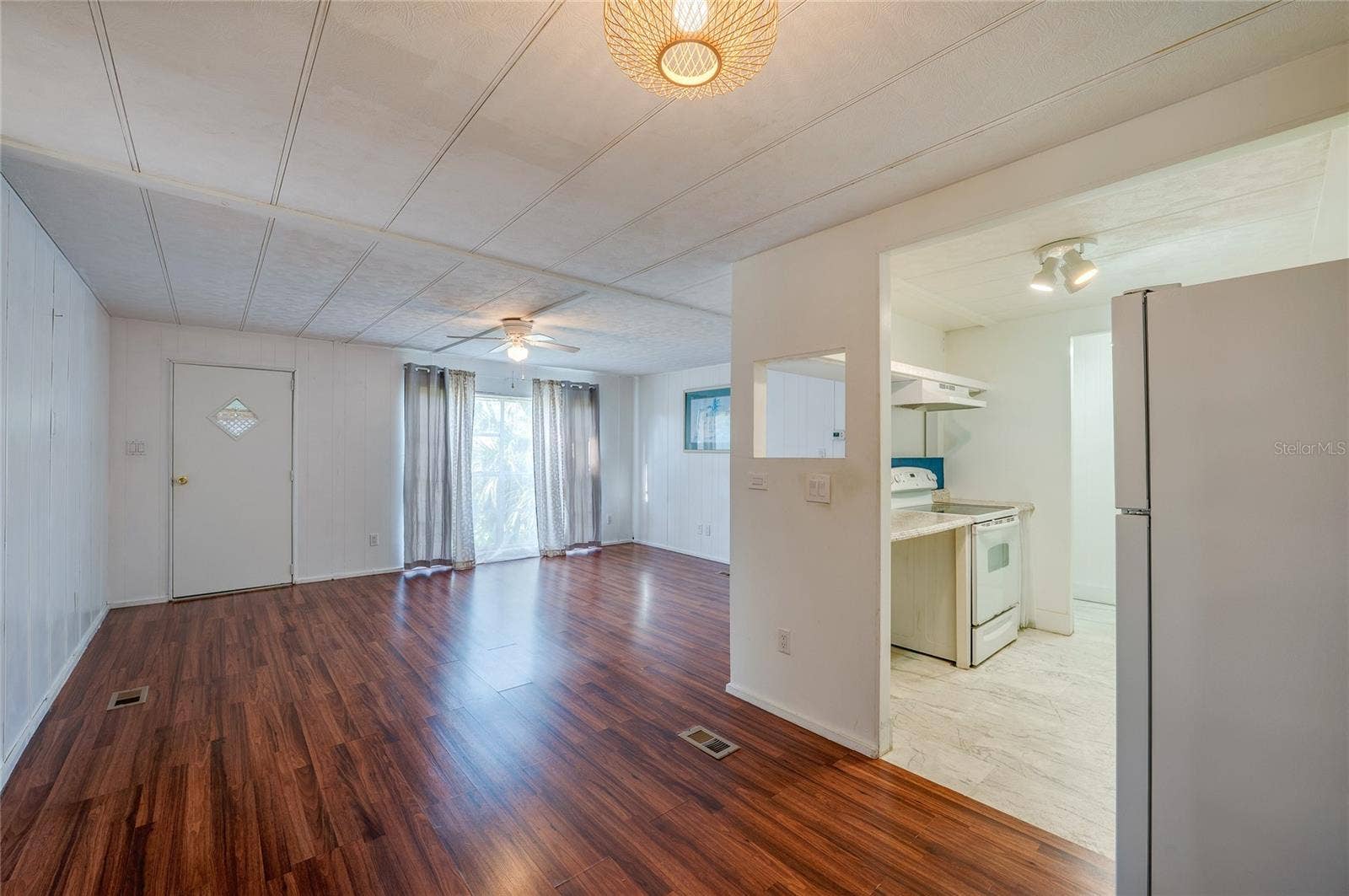Spacious main living area offers an open layout with abundant natural light and direct connection to the kitchen, creating flexible options for everyday living and dining.