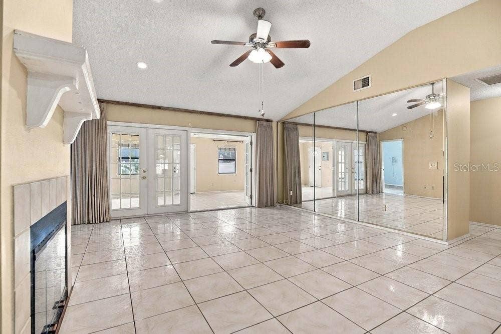 Living room overlooking enclosed Florida Room