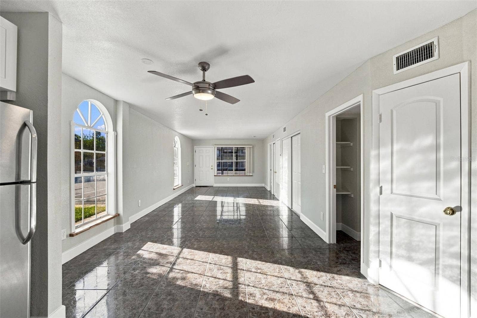 313 DIRKSEN DRIVE, #G4, Debary, FL 32713 LIVING ROOM VIEW FROM KITCHEN