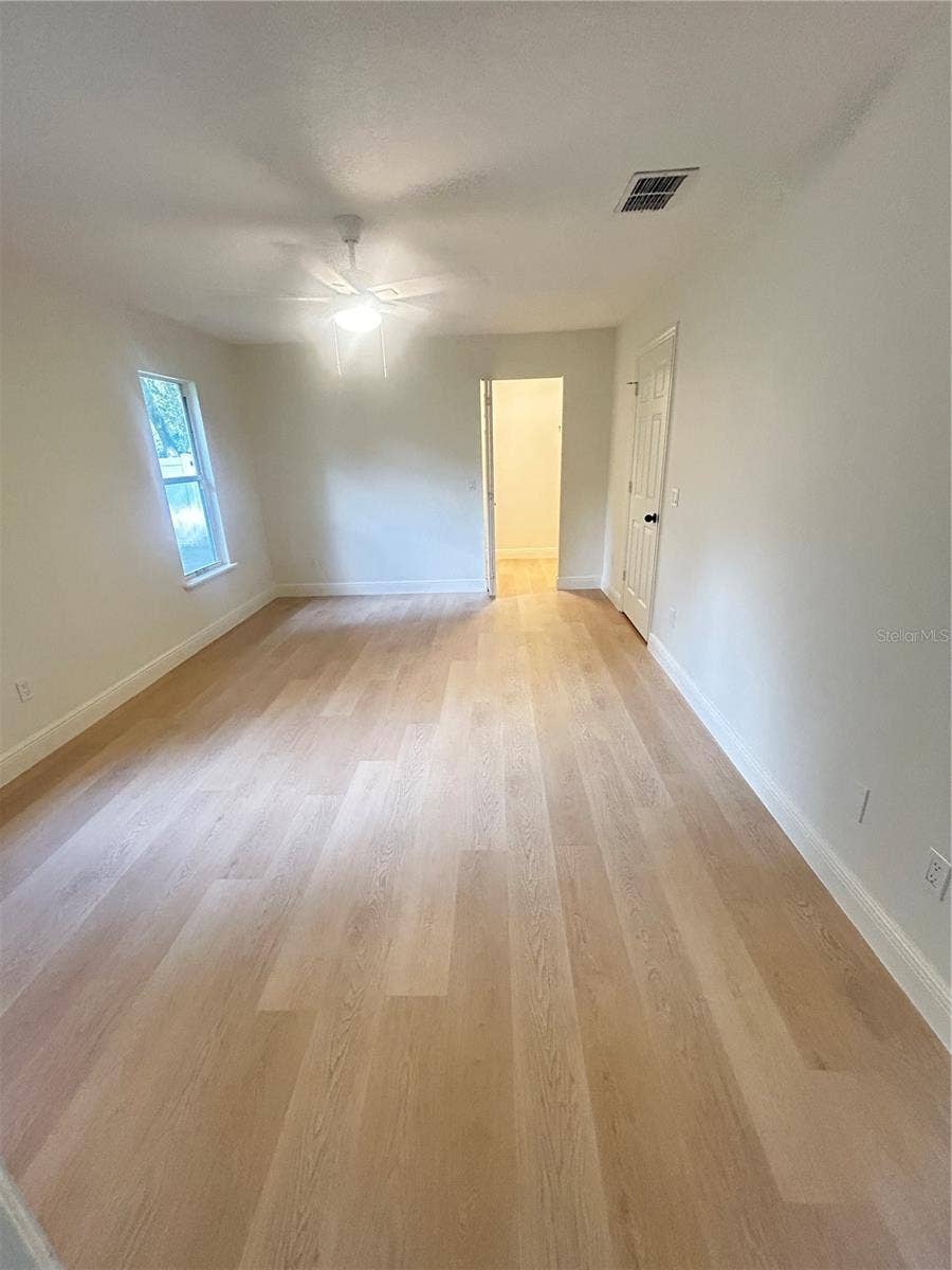 1901 KNOLTON AVENUE, Orange City, FL 32763 PRIMARY SUITE WITH WALK IN CLOSET AND ENSUITE BATHROOM