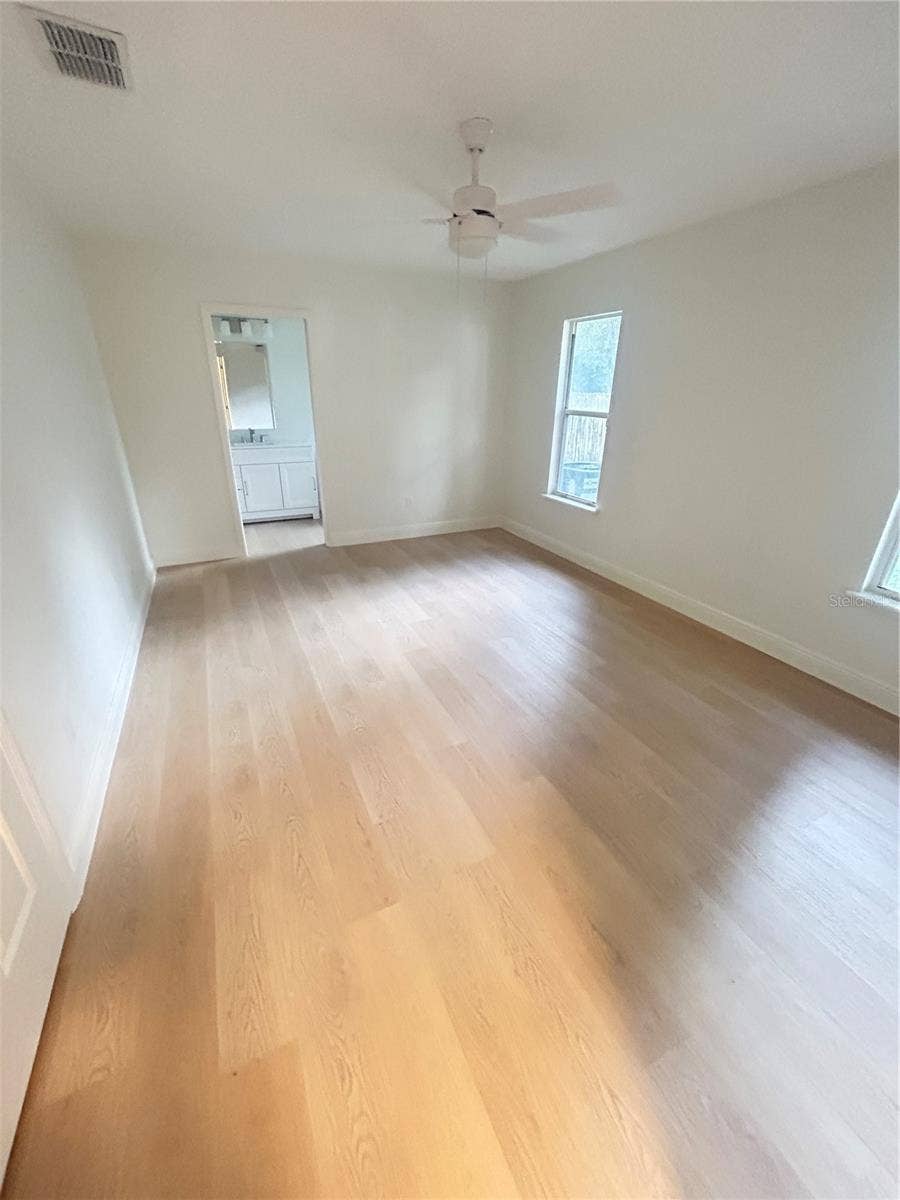 1901 KNOLTON AVENUE, Orange City, FL 32763 PRIMARY BEDROOM WITH ENSUITE BATHROOM/SHOWER