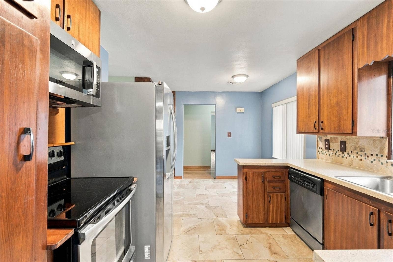 480 W NEW YORK AVENUE, Orange City, FL 32763 Kitchen From Florida Room, eating space in kitchen