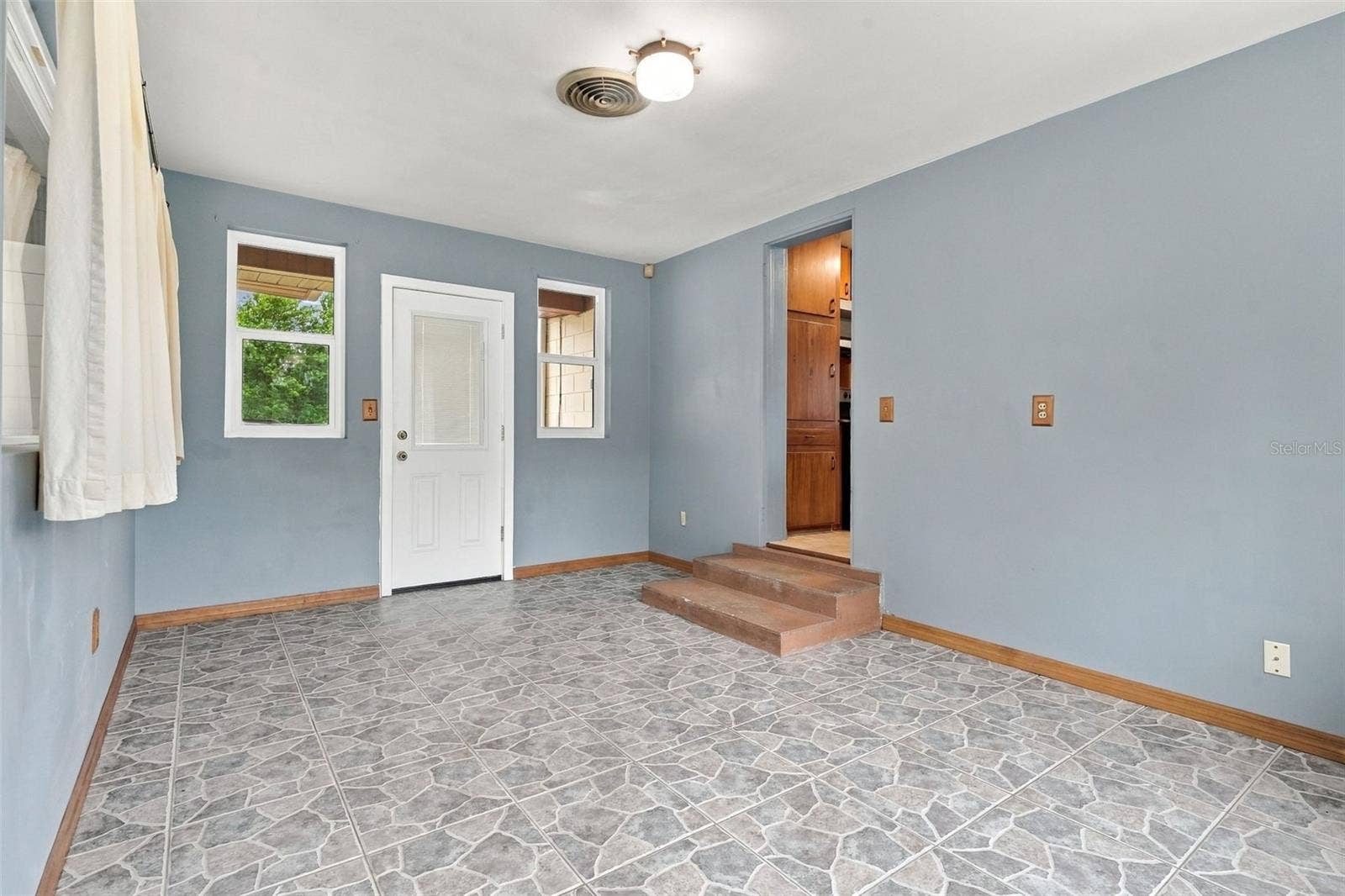 480 W NEW YORK AVENUE, Orange City, FL 32763 Florida Room from Carport