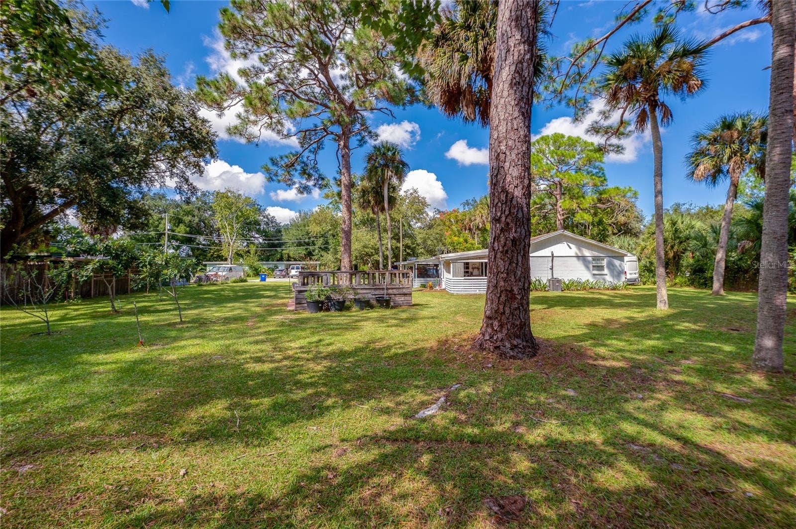 Large back yard and adjacent lot convey or can be split.