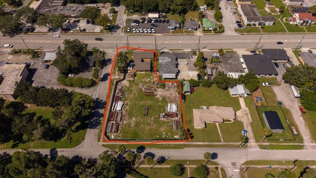 219 S SPRING GARDEN AVENUE, Deland, FL 32720 Aerial of entire parcel with frontage on 3 streets: 15-A, Voorhis and Dexter.