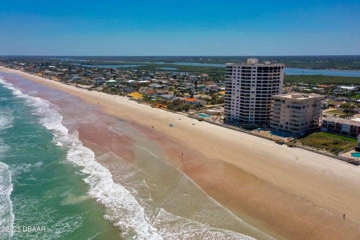 Enjoy the best of both worlds with sweeping vistas of the coastline to the south and charming neighborhood surroundings inland.
