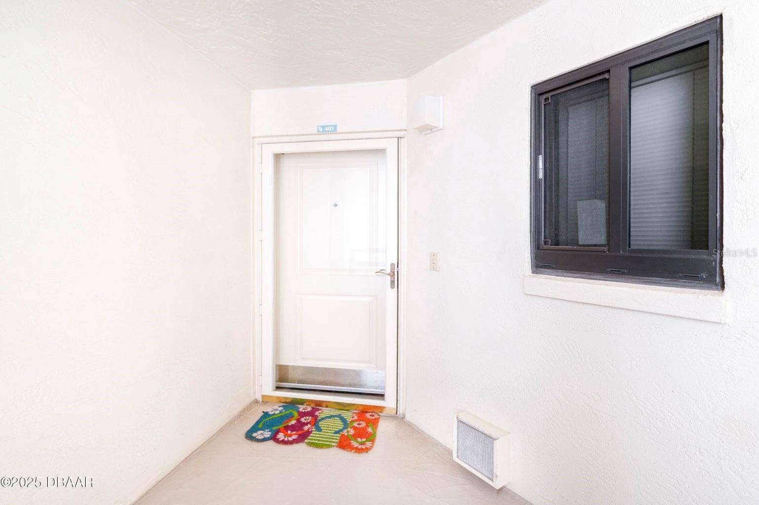 This unit offers privacy with a quiet entry and welcoming coastal touches.