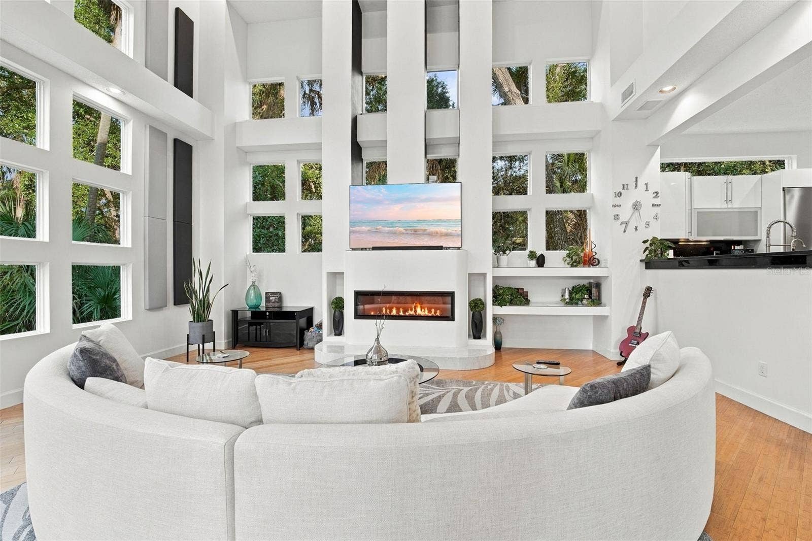 2586 E SPRUCE CREEK BOULEVARD, Port Orange, FL 32128 FAMILY ROOM | expansive glass, and a sophisticated interplay of indoor and outdoor spaces