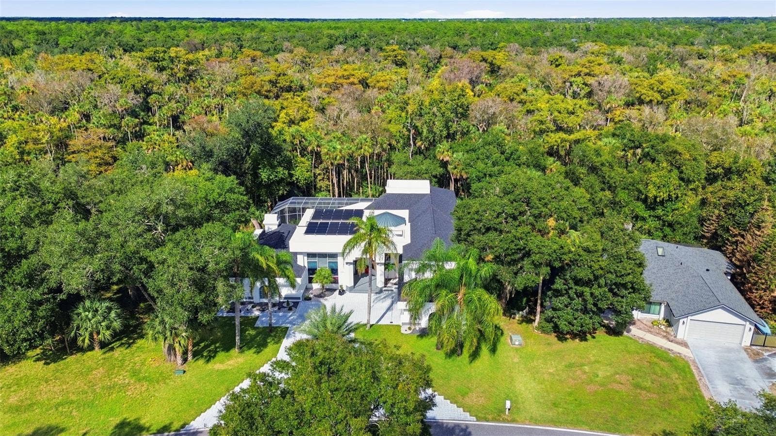 2586 E SPRUCE CREEK BOULEVARD, Port Orange, FL 32128 FRONT AERIAL VIEW