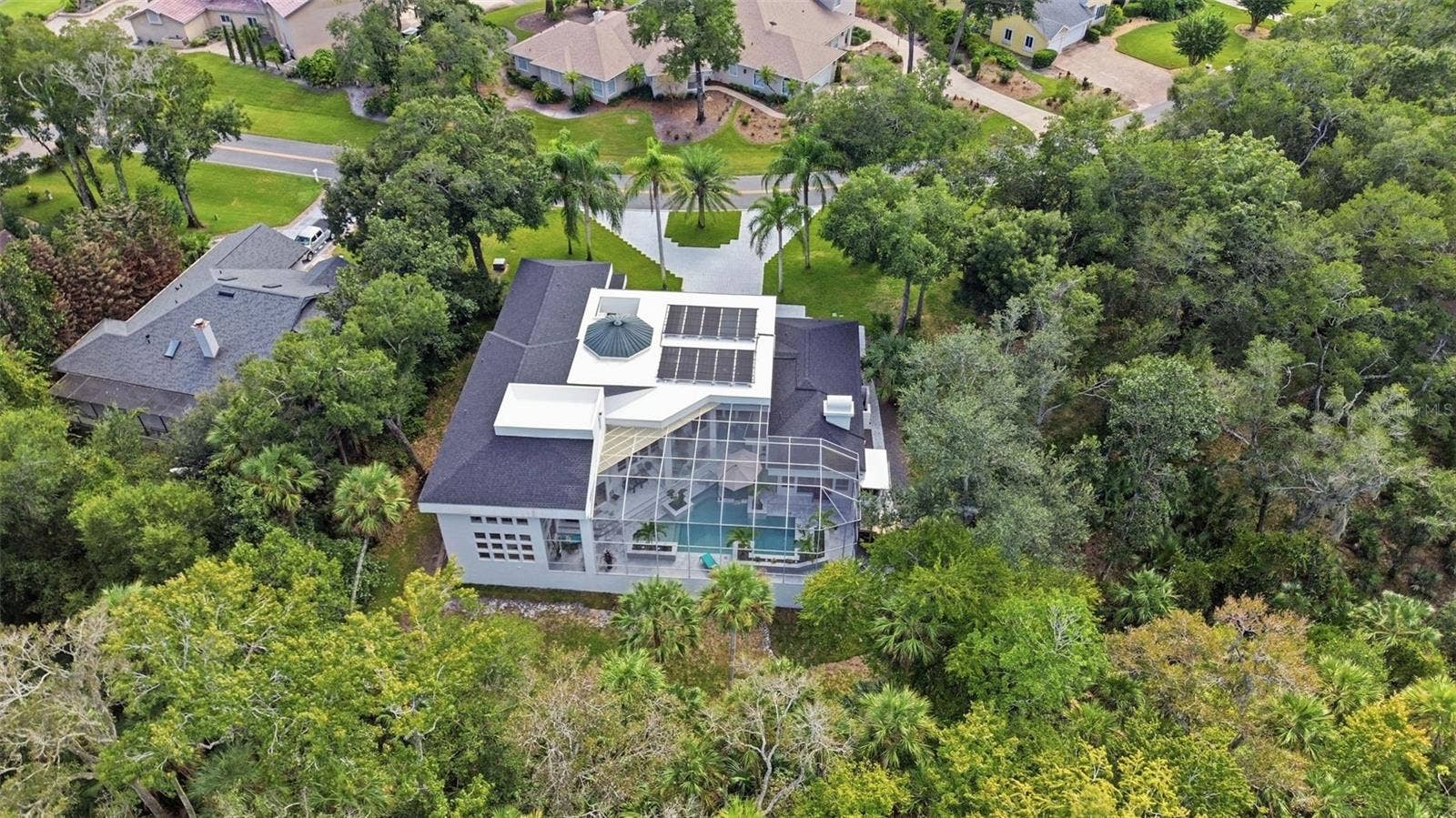 2586 E SPRUCE CREEK BOULEVARD, Port Orange, FL 32128 REAR AERIAL VIEW