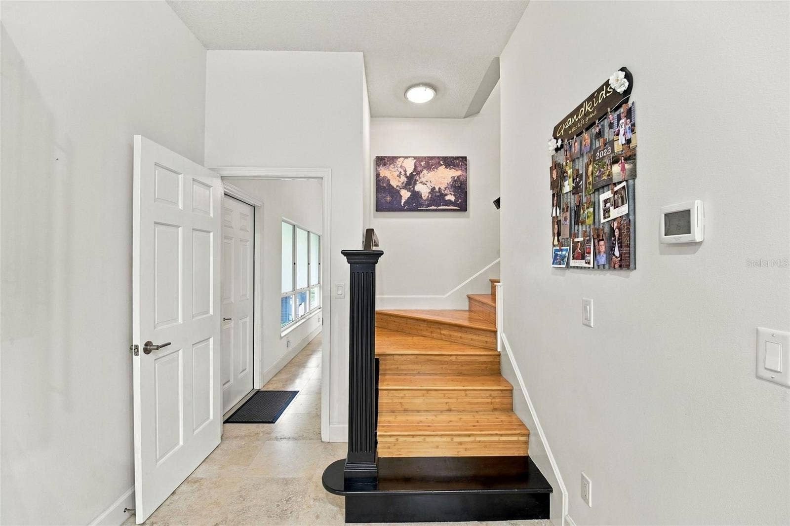 2586 E SPRUCE CREEK BOULEVARD, Port Orange, FL 32128 2nd STAIRCASE FROM KITCHEN