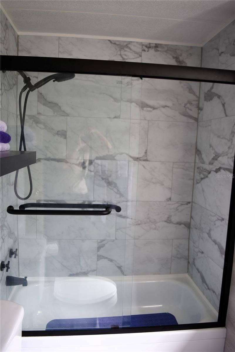 928 BLUE HERON BOULEVARD, Osteen, FL 32764 Guest bath