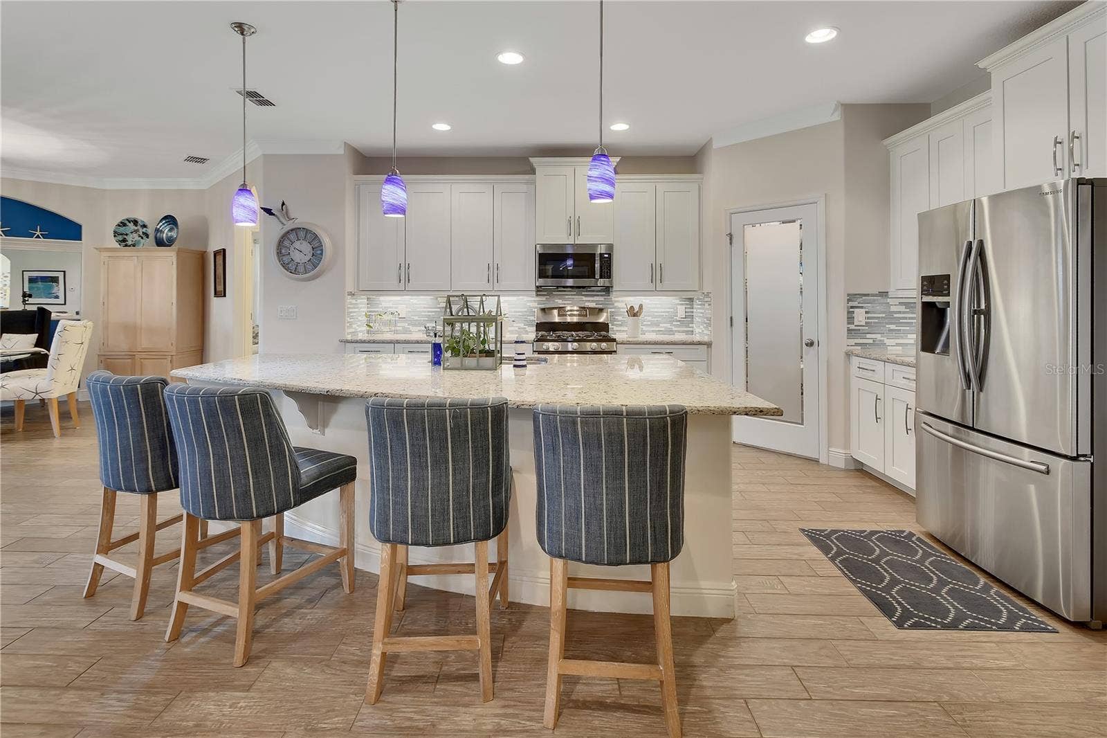 126 MYRTLEBERRY LANE, Deland, FL 32724 Kitchen with curved island