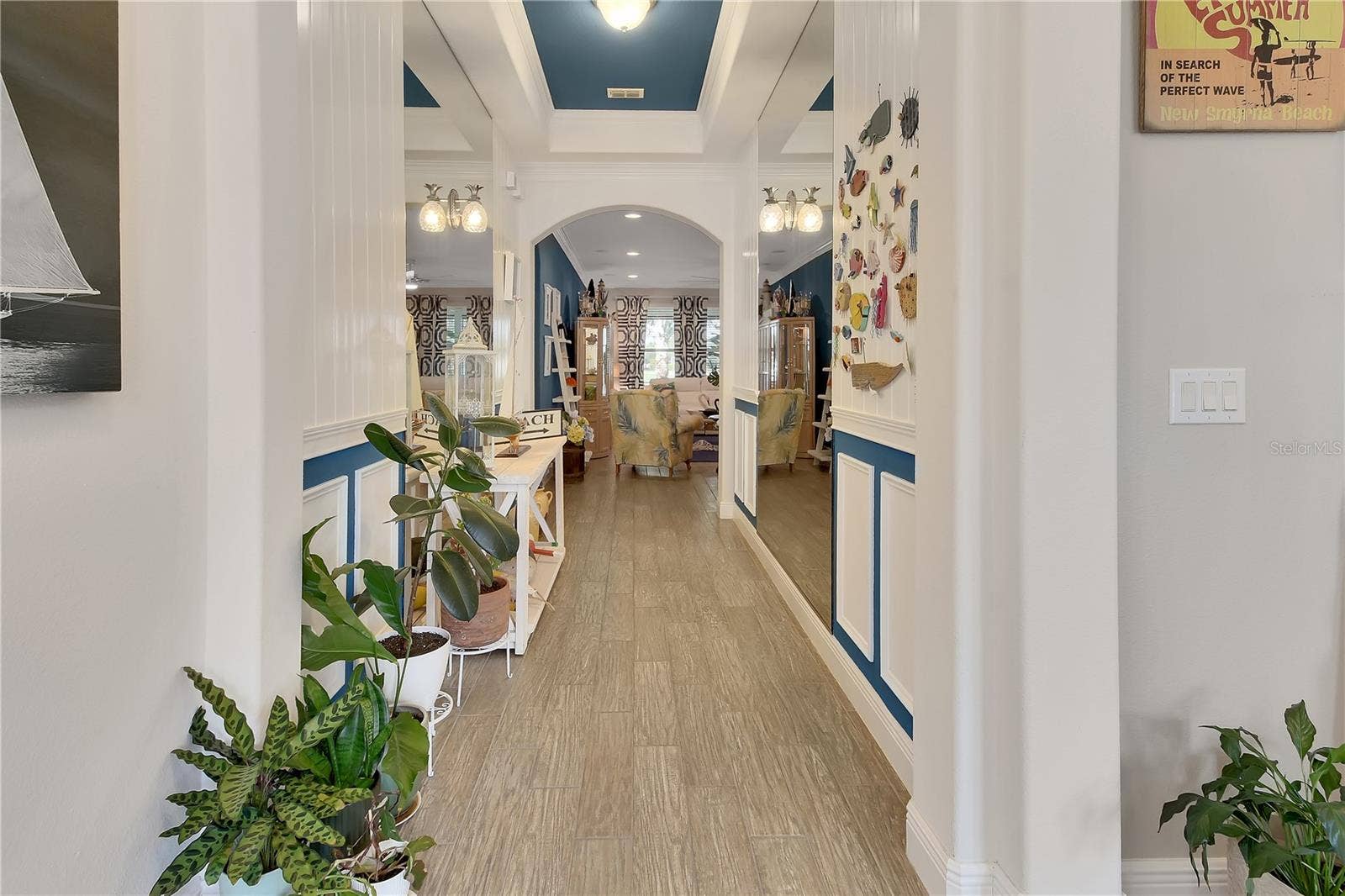 126 MYRTLEBERRY LANE, Deland, FL 32724 Coastal foyer with wainscotting