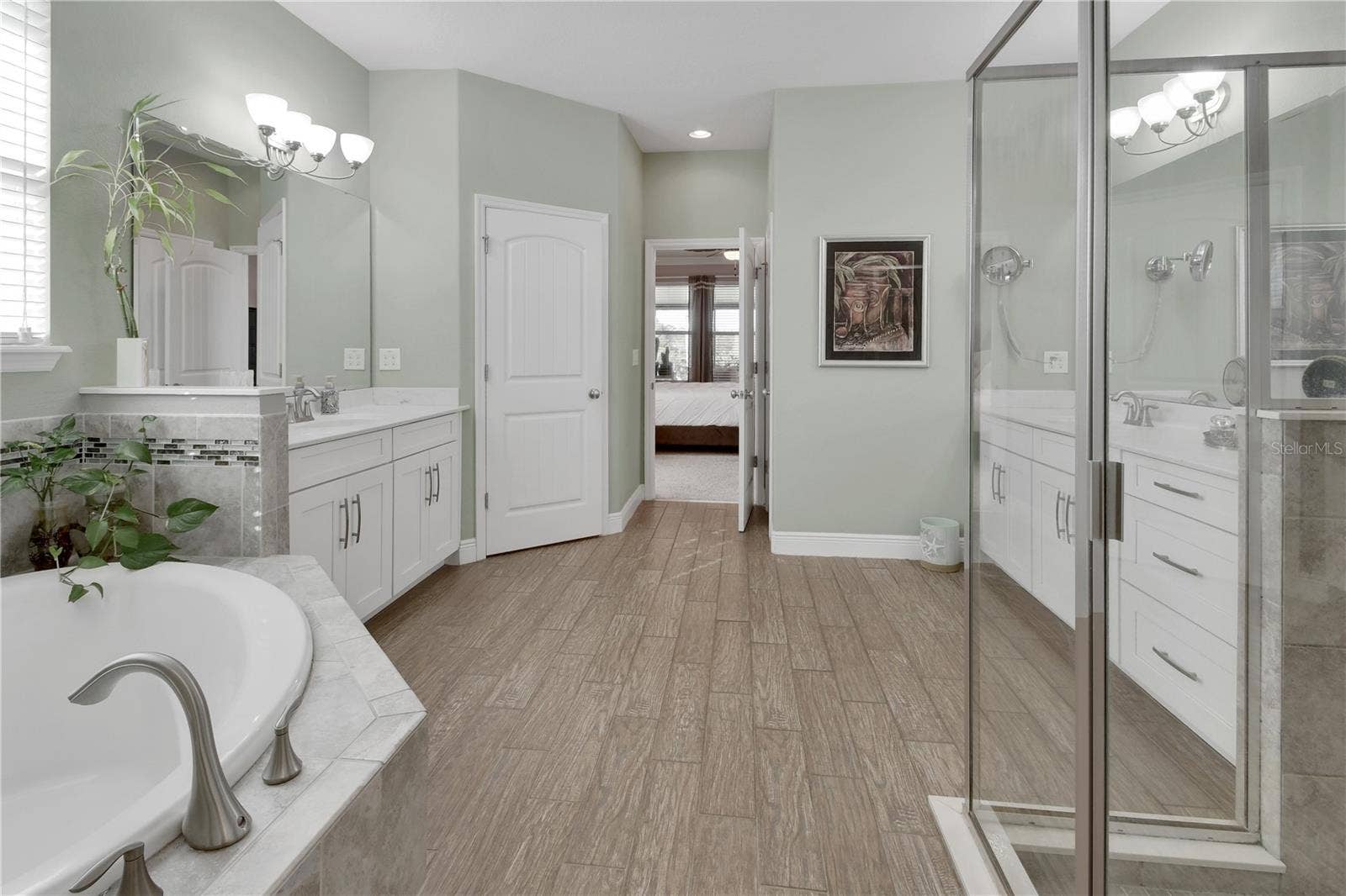126 MYRTLEBERRY LANE, Deland, FL 32724 Privacy Lavatory and linen closet behind entrance door