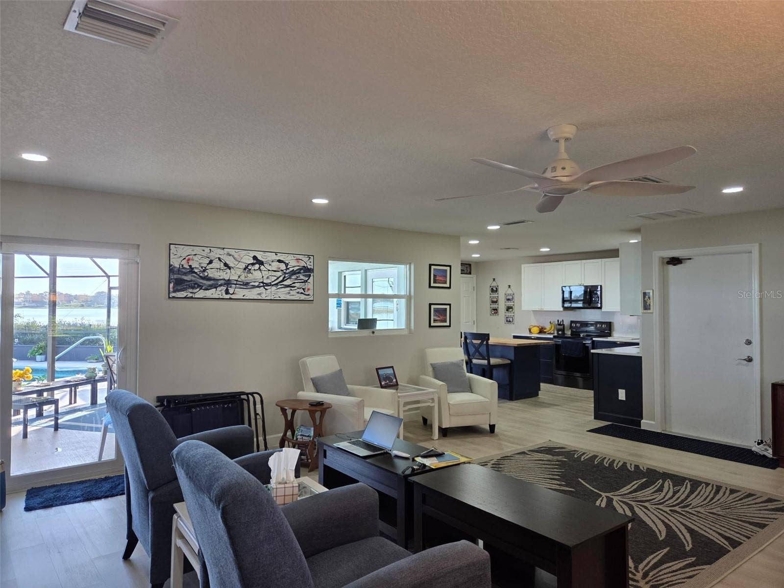 2526 RUSK COURT, Deltona, FL 32738 View of the kitchen from the great room