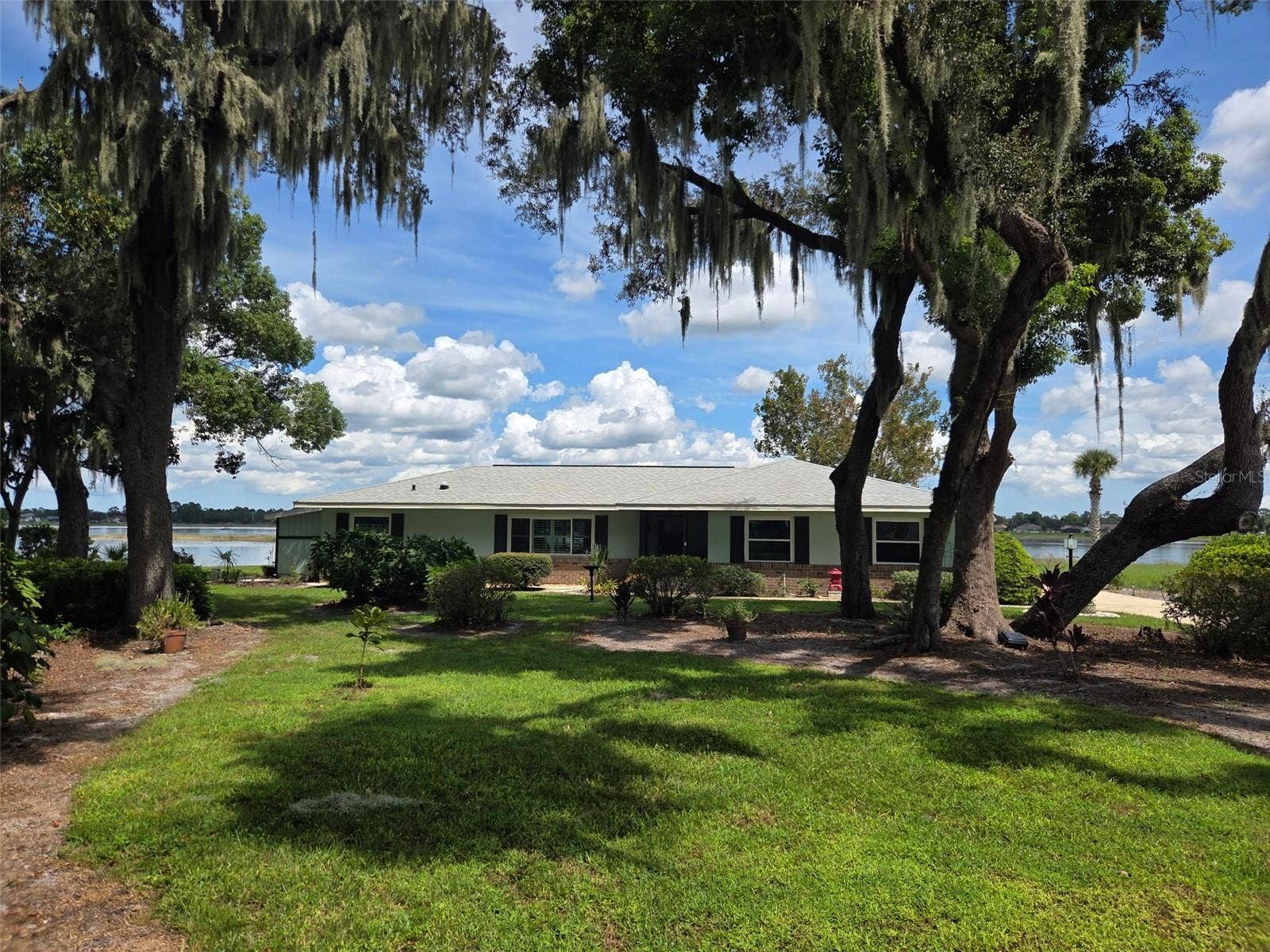 2526 RUSK COURT, Deltona, FL 32738 Front view of the property from the road