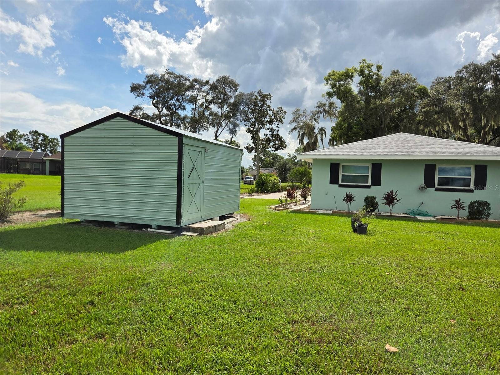 2526 RUSK COURT, Deltona, FL 32738 Rear view of the property