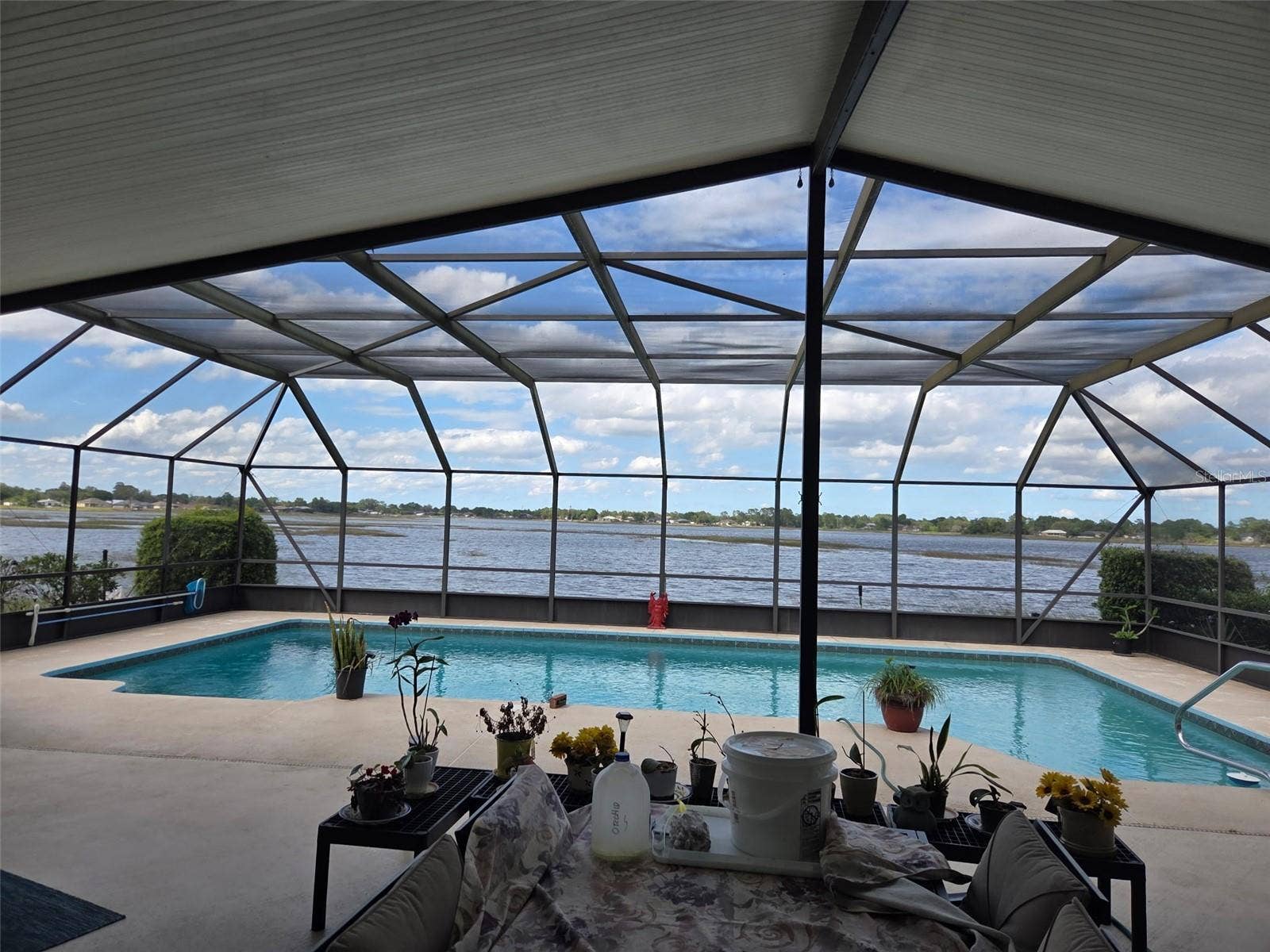 2526 RUSK COURT, Deltona, FL 32738 Pool view overlooking Lake Theresa
