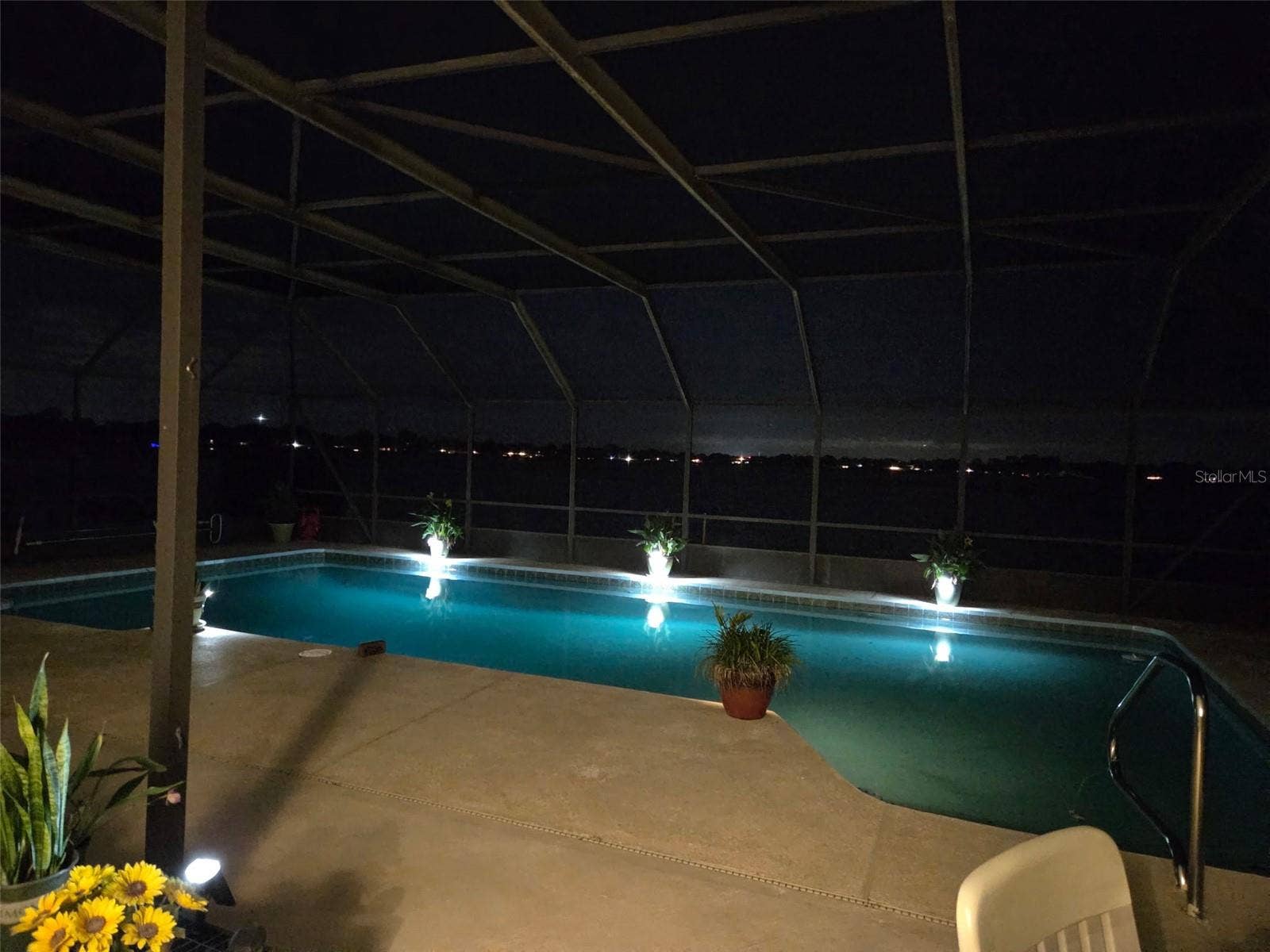 2526 RUSK COURT, Deltona, FL 32738 Pool view after dark