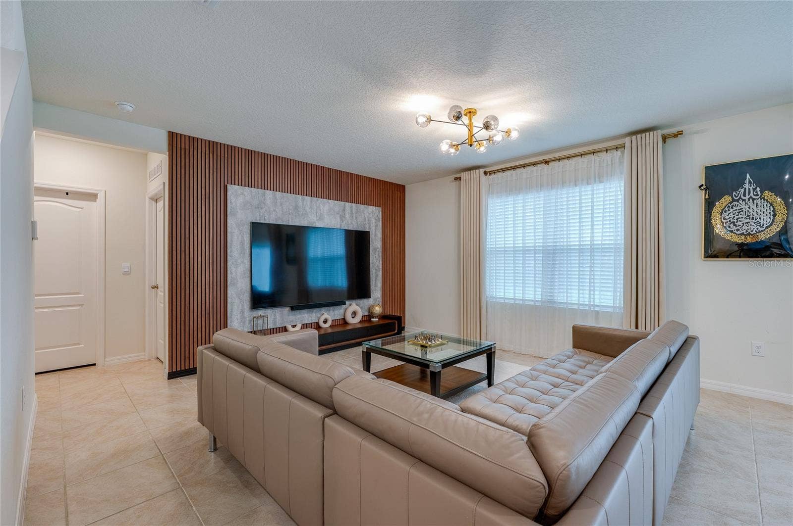 515 BARONESS WAY, Deland, FL 32724 Living Room with custom wall