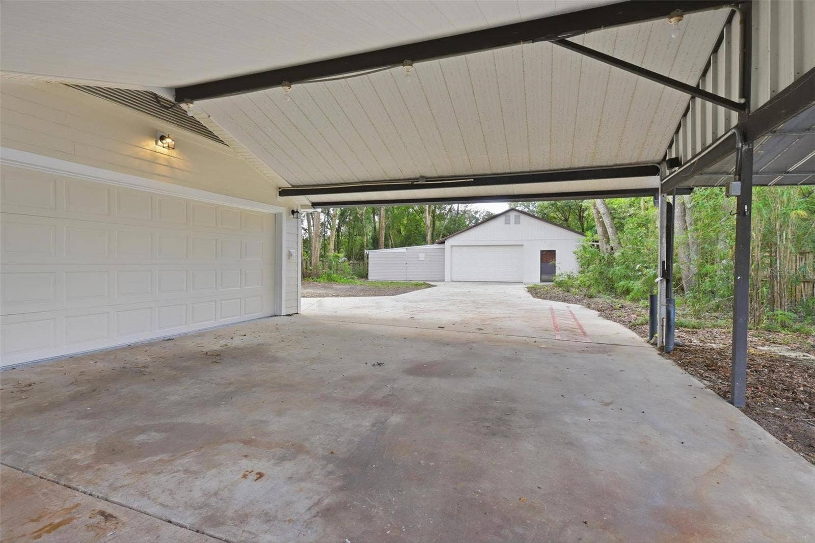 2662 PALM TERRACE, Deland, FL 32720 Carport leading into Detached Garage No 1